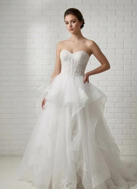 April Floral Lace Ruffled Strapless Debutante Ball Gown - model turning in white lace corset ruffled tulle ball gown for Melbourne debutante