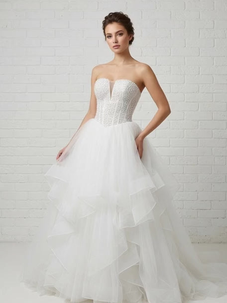 Ophelia Ruffled Pearl Beaded Strapless Debutante Ball Gown - model turning in sparkling white pearl corset ruffled tulle ball gown for Melbourne debutante