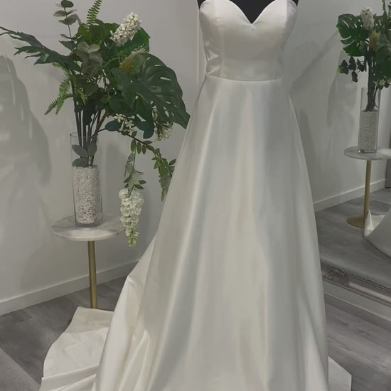 Opal Satin A-Line Wedding Dress showcasing elegance and simplicity at Divine Bridal.