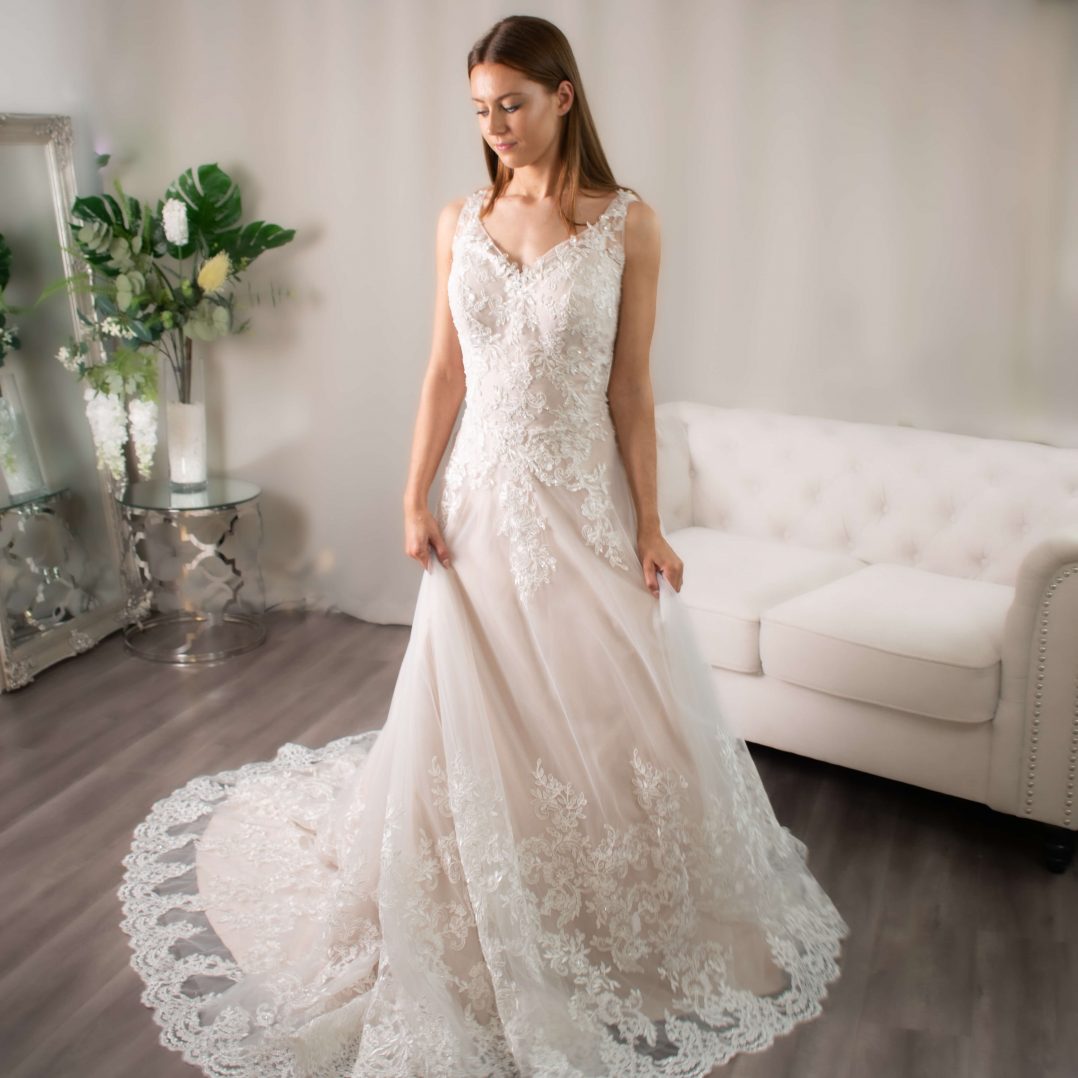 Elegant Seashell A-line Lace Wedding Dress with V-neckline