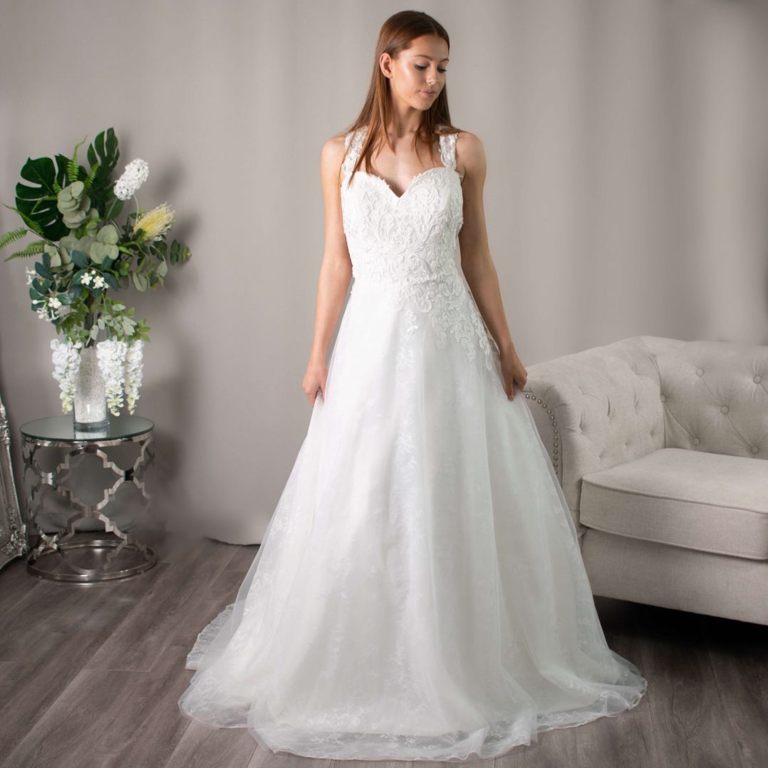 Bernadette A-line ballgown with lace bodice and floral appliqué from Divine Bridal.
