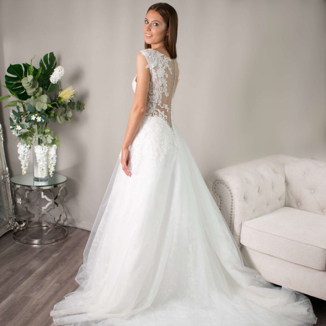 Bernadette A-line ballgown with lace bodice and floral appliqué from Divine Bridal.